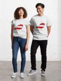 Two people wearing matching Austrian flag T-shirts, standing side by side.