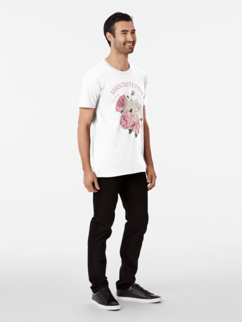 Man wearing a white T-shirt with a floral design and the word "Hirschstetten."
