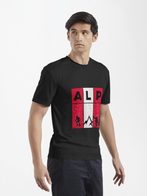 Man wearing a black T-shirt with an "ALP" design.