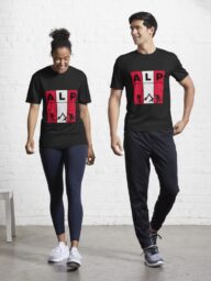 Two people wearing black T-shirts with "ALP" design.