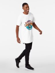 Model walking in a "Summer Time" white T-shirt and black pants.