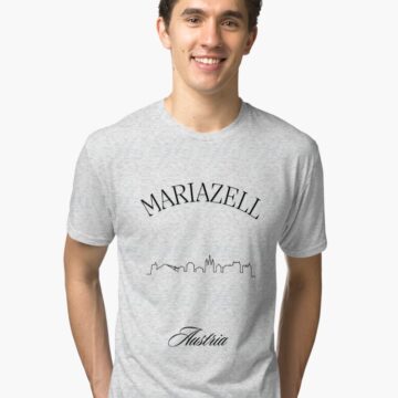 Young man wearing a Mariazell Austria T-Shirt with a minimalist skyline design.