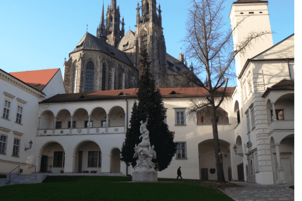 View of the Cathedral of St. Peter and Paul in Brno with the Biskupský dvůr courtyard in the foreground.