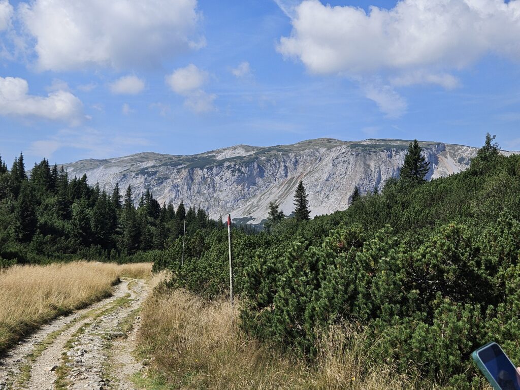 Hiking trail with a view of the mountains from Rax, near Vienna, Austria