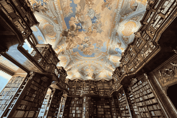 St. Florian Monastery Library with ornate ceiling frescoes and wooden bookcases