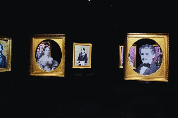 Historical portraits displayed at the Johann Strauss Museum exhibition in Vienna.