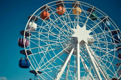 Colorful Ferris wheel near Parndorf Outlet on a sunny day in Austria