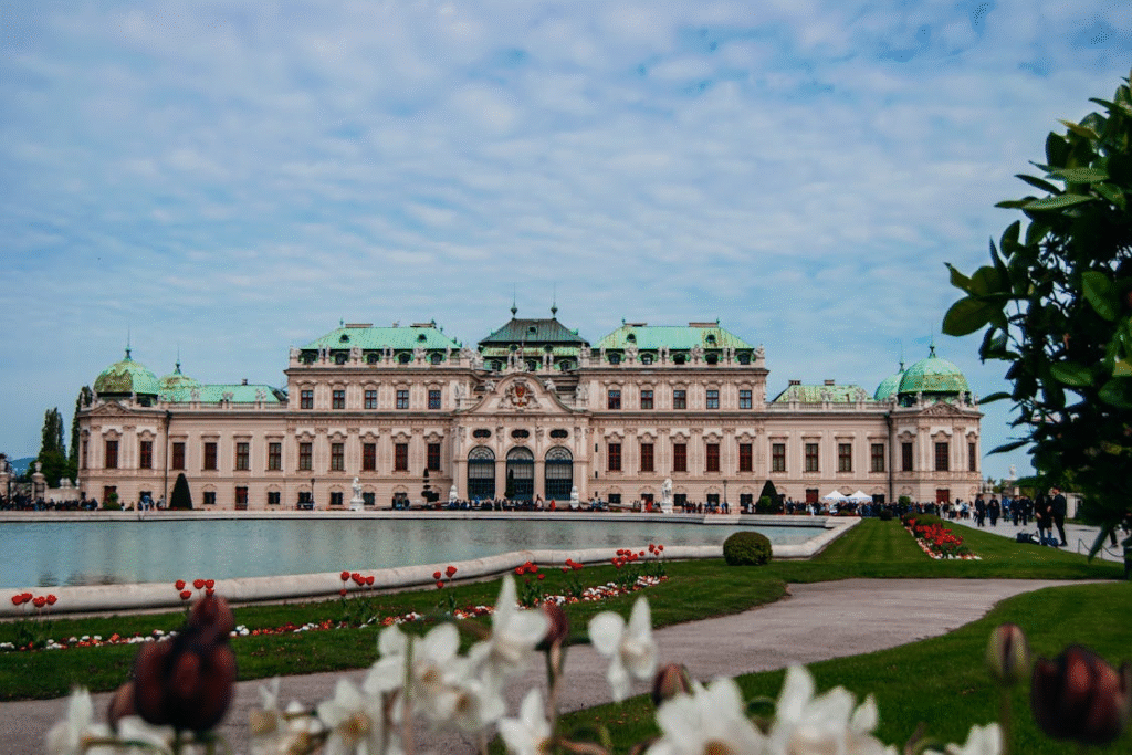 Upper Belvedere Palace in Vienna with garden and reflection in the pond